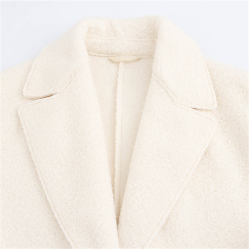 Manteau en laine élégant , à revers, boutonnage simple