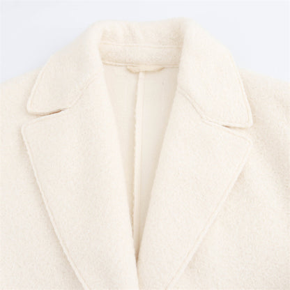 Manteau en laine élégant , à revers, boutonnage simple